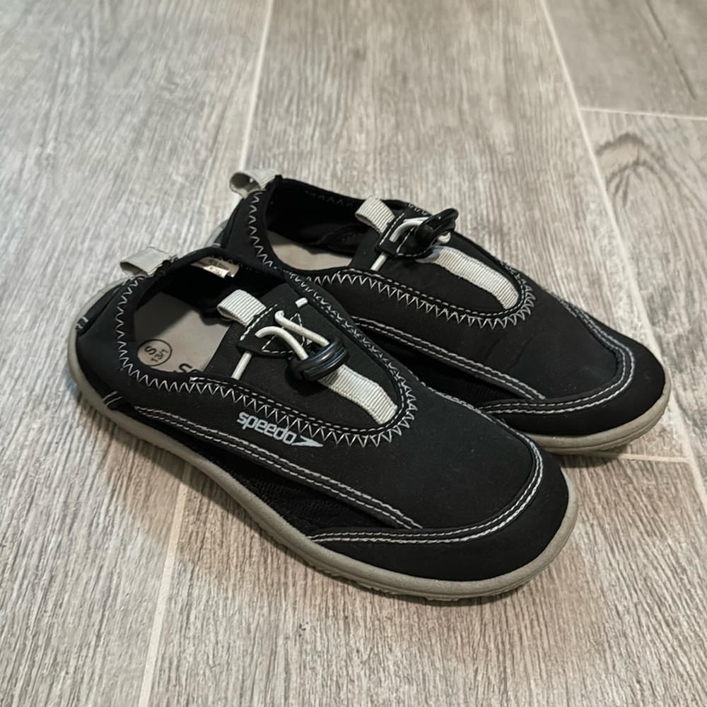 Youth speedo, water shoes, size small